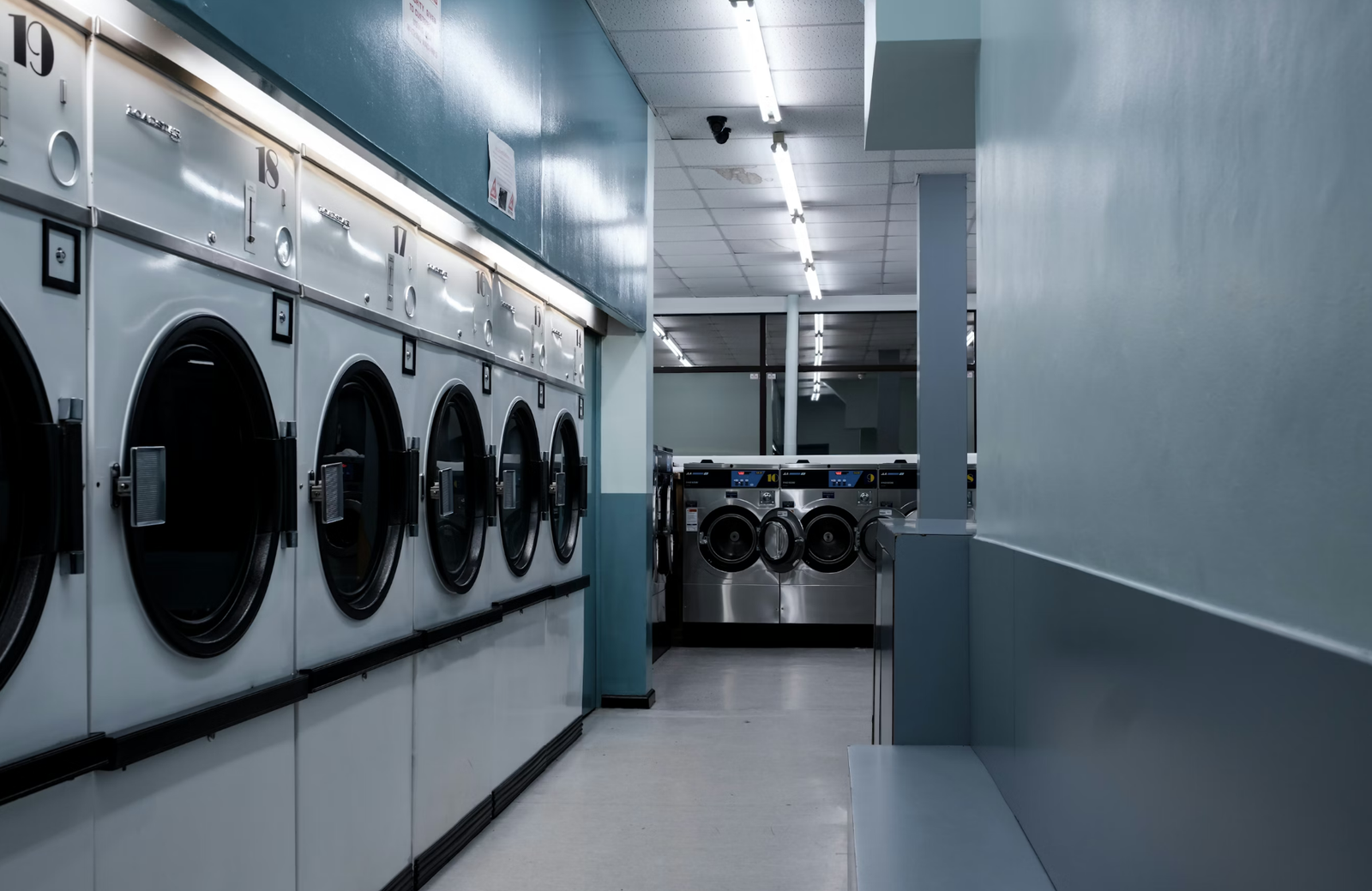 Modern washing machines in a clean laundry shop